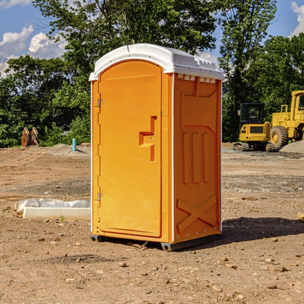 how often are the portable restrooms cleaned and serviced during a rental period in Lawrence